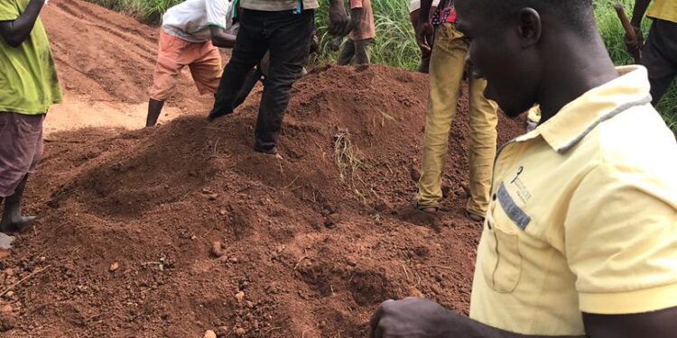 Salaga South MP rescues Dagombia community by rehabilitating rain-hit bad road.