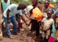 Salaga South MPs Aide cuts sod for the construction of a six unit classroom Block at Bagabaga