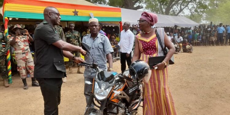 Abu Jinapor Gift’s brand new motorbike to Teacher for exhibiting sense of patriotism by watering Green Ghana plants at Ndewura Jakpa senior High School .