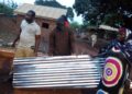 Former member of parliament for Salaga South Donates  packets of roofing sheets to victims of Kumabuye and Masaka rainstorm.