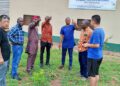 MCE for East Gonja, Hon. Richard Broni and a team of technicians inspects 1D1F Rice Processing Project.
