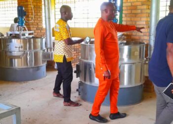 West Gonja MCE, 1D1F beneficiaries and Rural enterprise officers inspects fitted equipment at 1d1f factory.