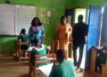 Savannah Regional Education Director, Madam Mabel Judith Micah monitors BECE at North East Gonja and East Gonja examination Centers.