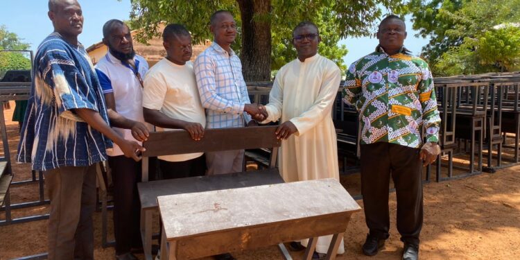 Partners of St. Theresa parish and Friends of Fr. Martin Boosts Education with 300 Dual Desks and Borehole Rehabilitation.